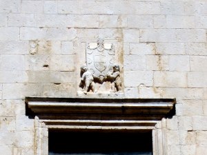 Other than a mildly creepy set of guys holding a crest from some long-ago ruling family